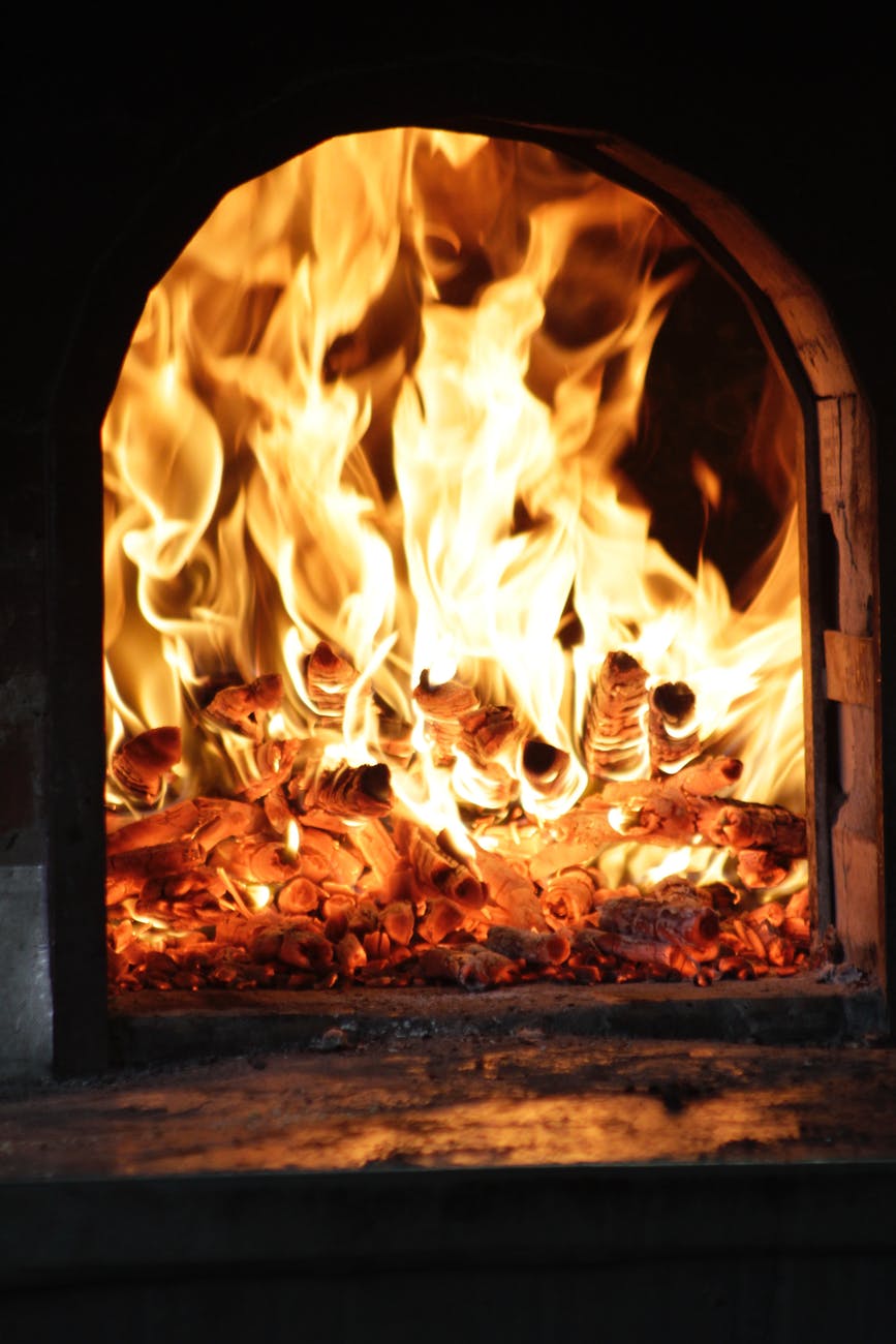 burning firewood in fire place